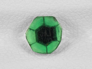 8802144-cabochon-intense-green-with-black-spokes-igi-colombia-natural-trapiche-emerald-0.56-ct