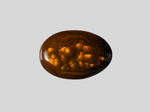 8802404-cabochon-brown-with-multi-color-swirls-&-bubbles-igi-mexico-natural-fire-agate-9.62-ct